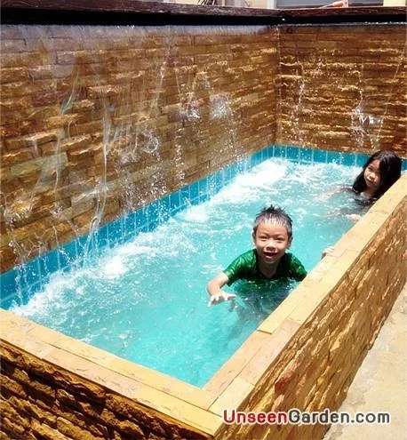 น้ำตกจำลองในสวนบ้าน พร้อมบ่อน้ำ ระบบหมุนเวียนน้ำ